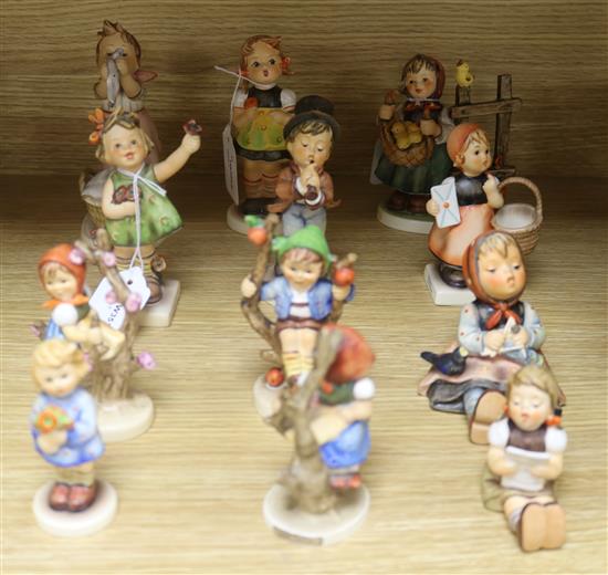 Twelve Goebel Hummel figures of children, Largest 14.5cm.